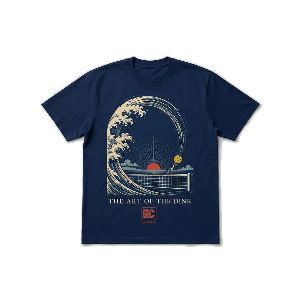 The Art of the Dink navy tee — Great Wave illustration with a pickleball cresting over a net